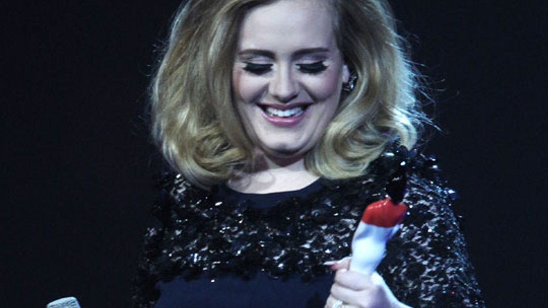 Adele denies rumours of secret wedding to fiancé Simon