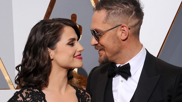   Actor Tom Hardy and Charlotte Riley arrive at the 88th Annual Academy Awards at Hollywood & Highland Center on February 28, 2016 in Hollywood