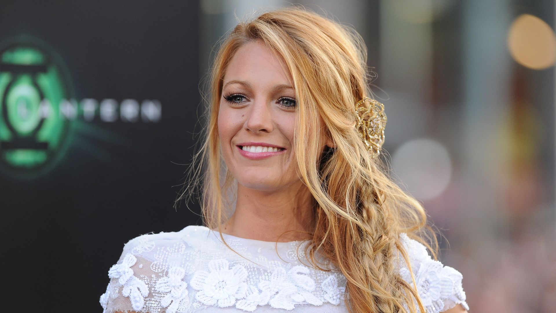 Blake Lively with fishtail hair and white dress