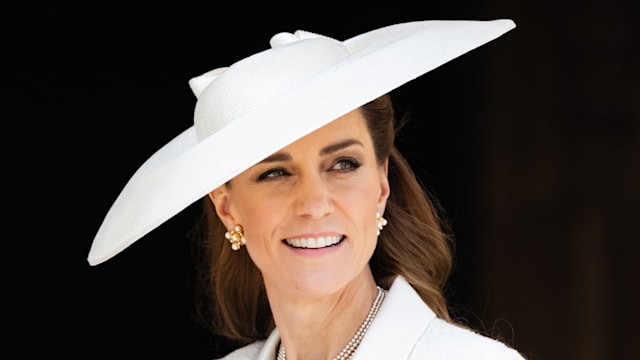 Princess Kate wearing white hat and dress