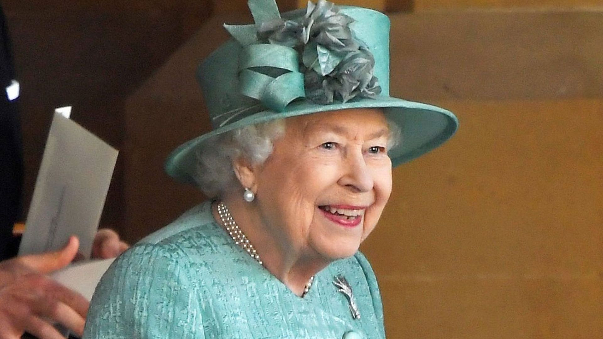 queen smiling parade