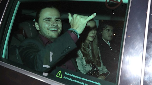 Prince Jackson through a car window smiling