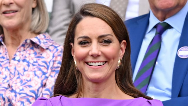 Kate Middleton laughing court-side of Centre Court during Wimbledon