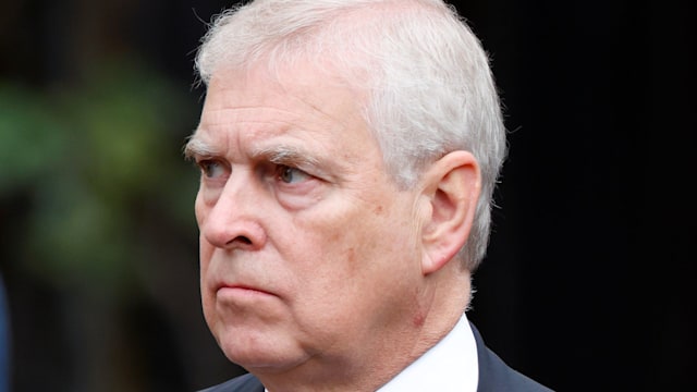 Prince Andrew in a grey suit 