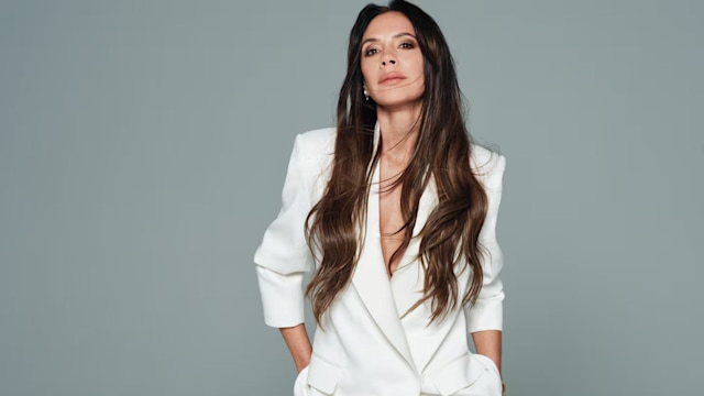 Victoria Beckham Wears a White double breasted Suit