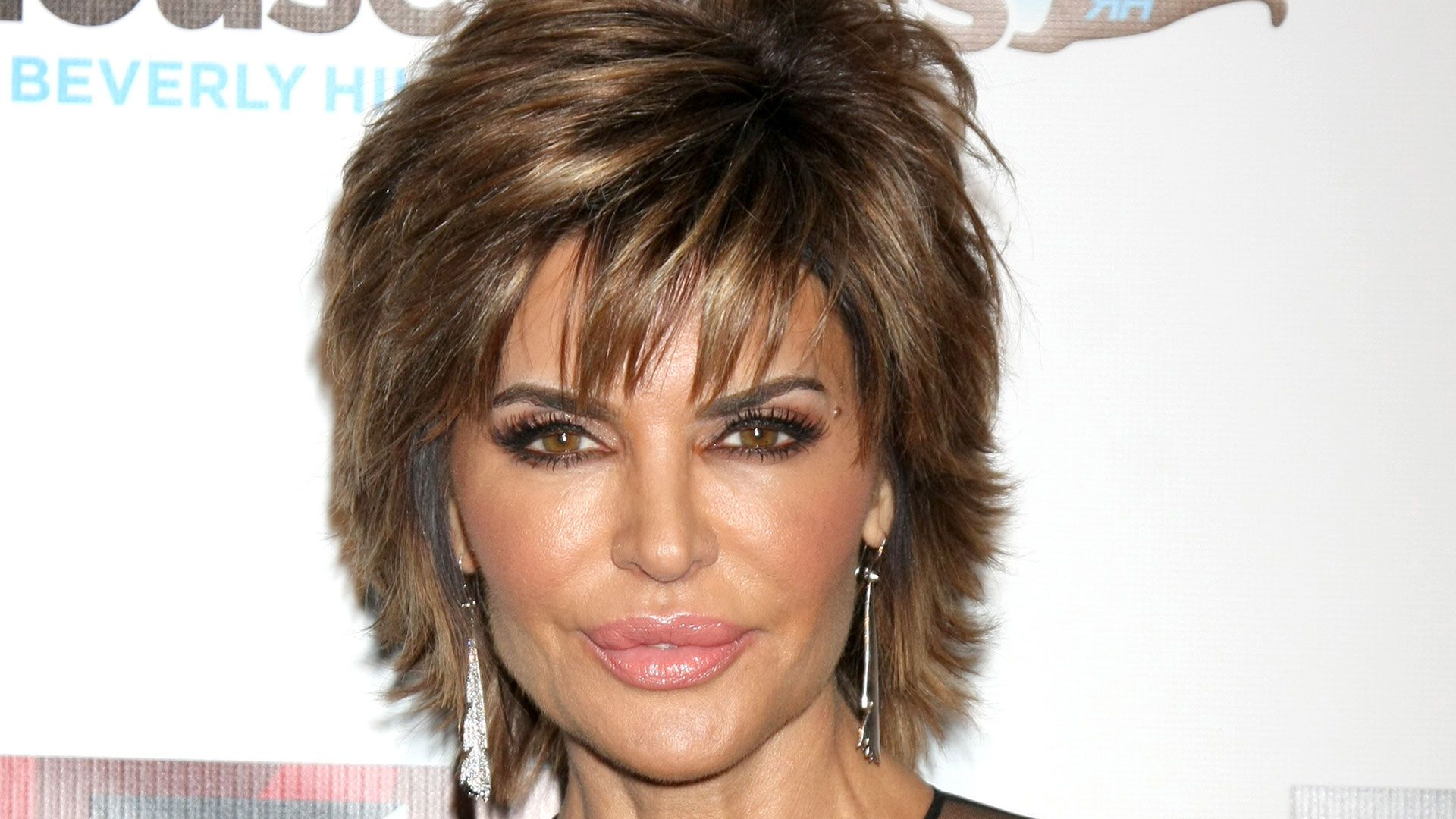 Close up of Lisa Rinna at a red carpet event for Real Housewives of Beverly Hills