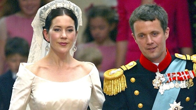 King Frederik and Queen Mary walking up the aisle