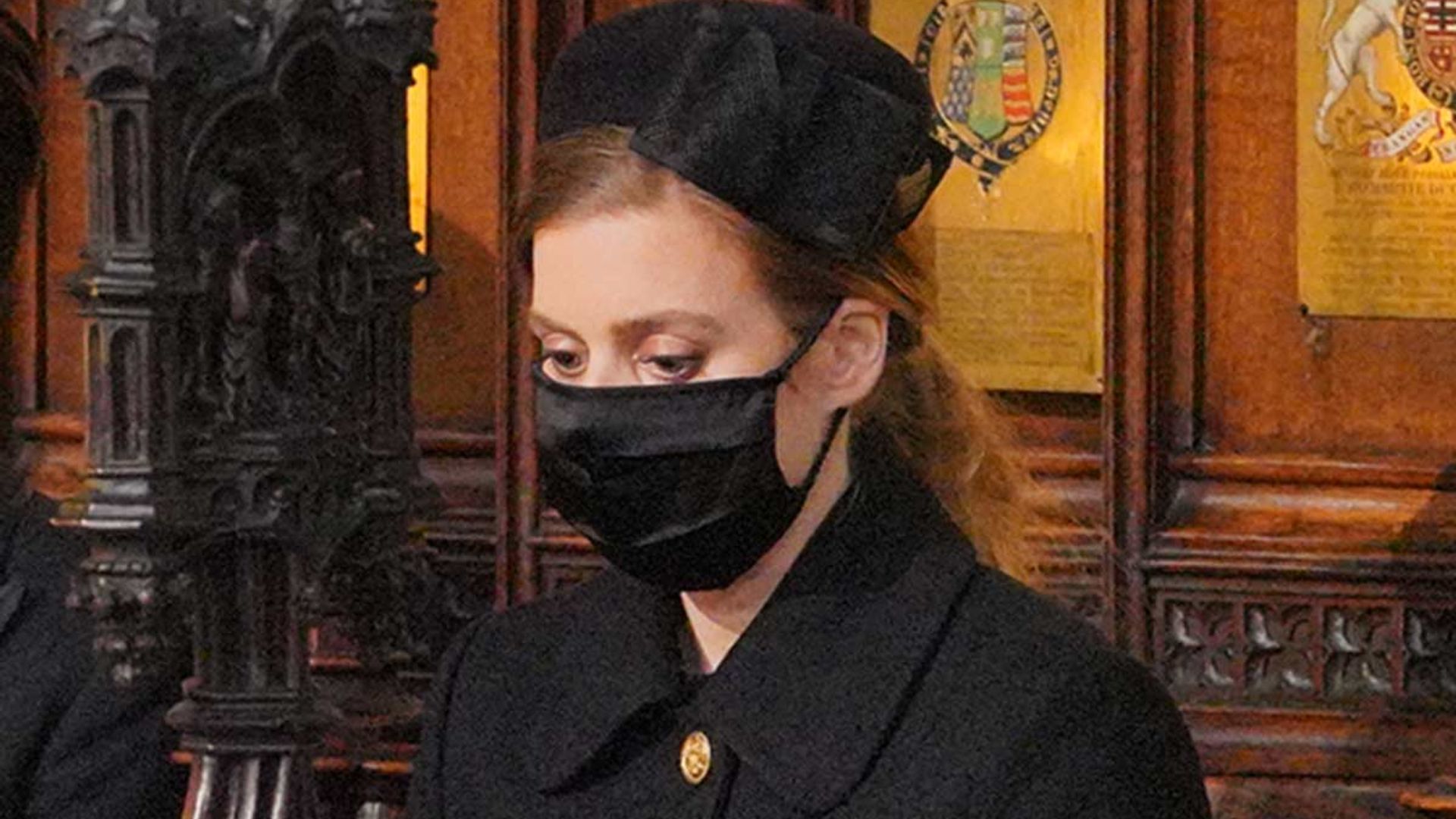 Princess Beatrice looks sombre in black as she pays her respects to the Duke of Edinburgh