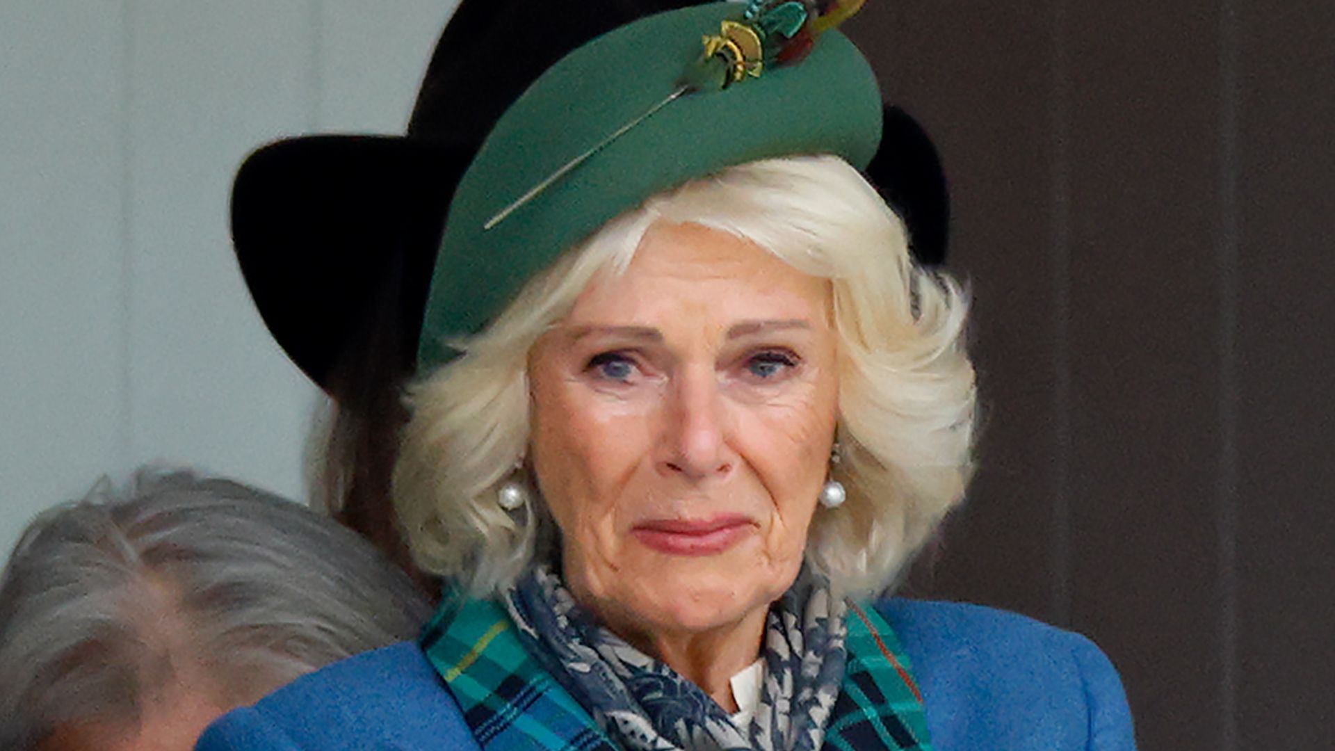 Queen Camilla sitting down at Braemar Royal Highland Gathering