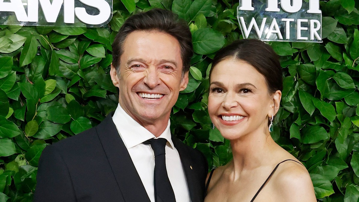 Hugh Jackman's girlfriend Sutton Foster oozes glamour in plunging dress during star-studded date-night
