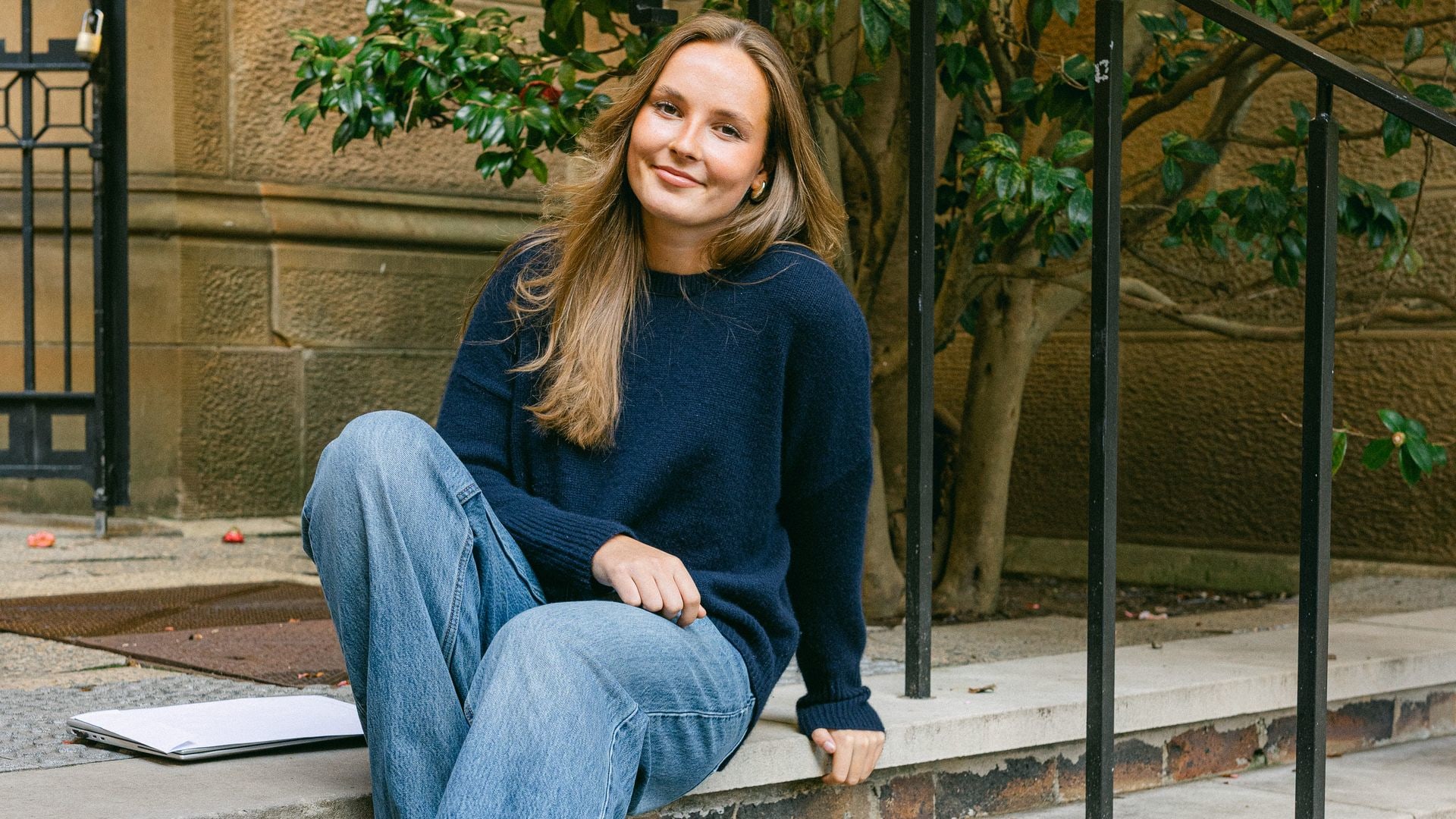 Princess Ingrid wearing jeans and jumper on campus