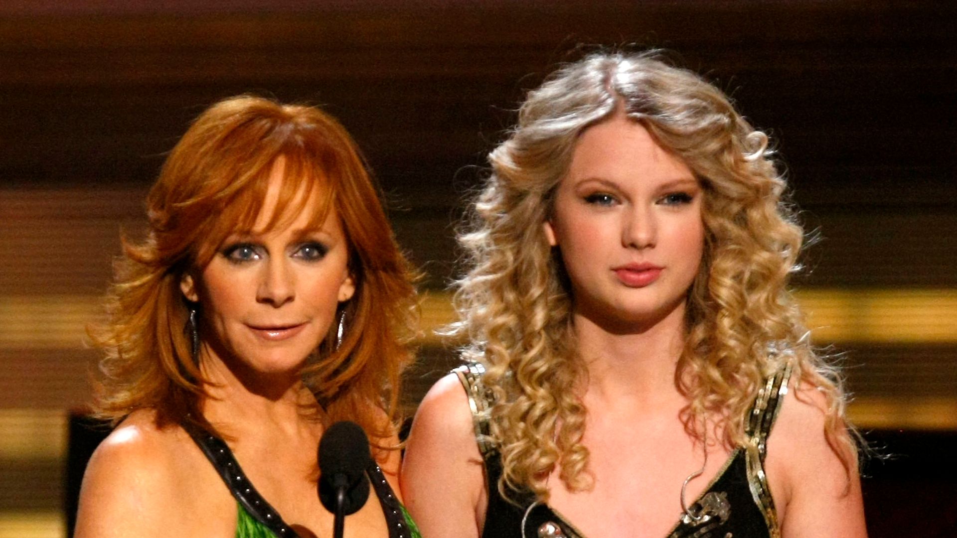 Reba McEntire with Taylor Swift as she accepts the Crystal Milestone Award onstage during the 44th annual Academy Of Country Music Awards held at the MGM Grand on April 5, 2009 in Las Vegas, Nevada