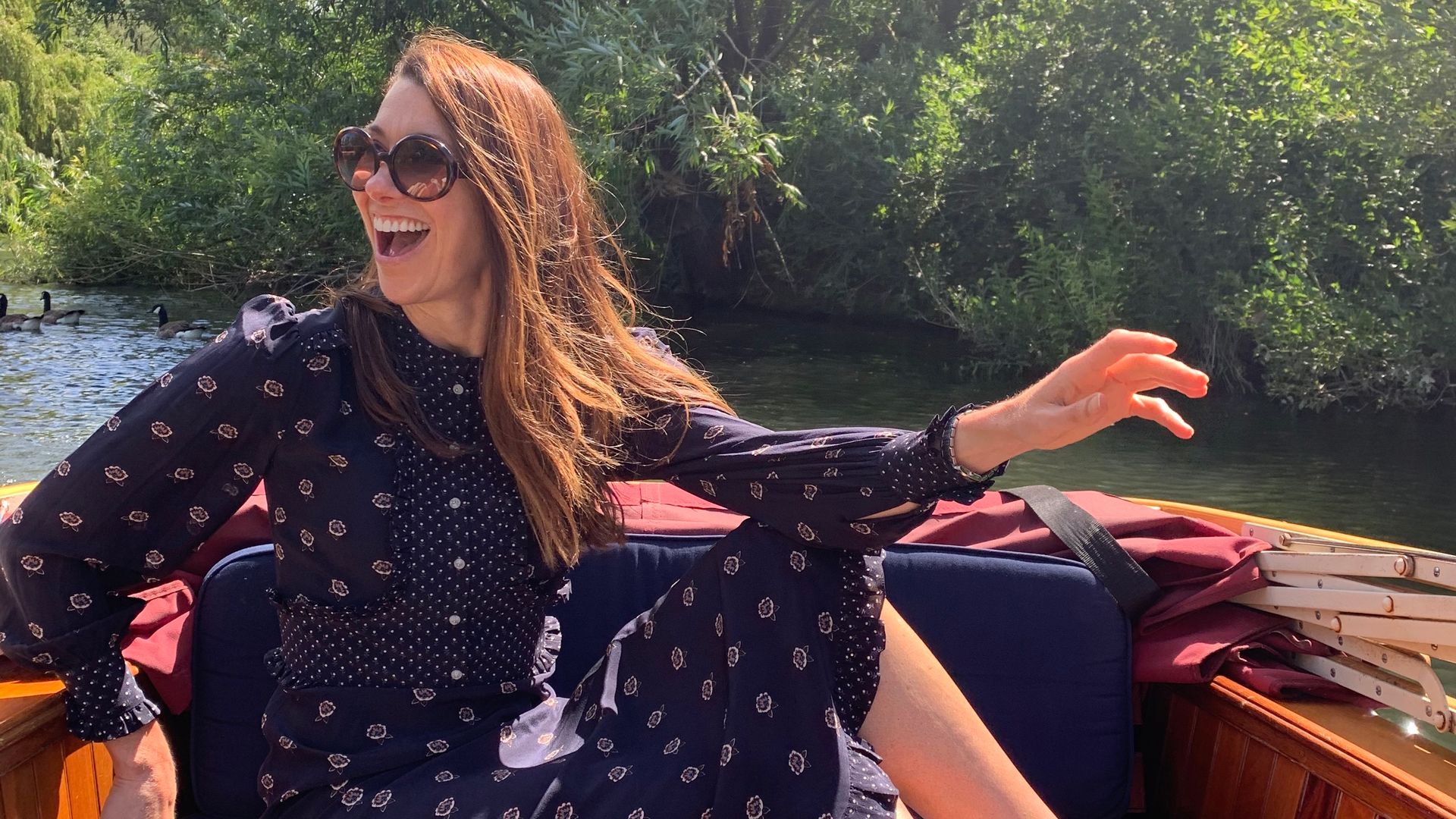 Woman laughing on a boat