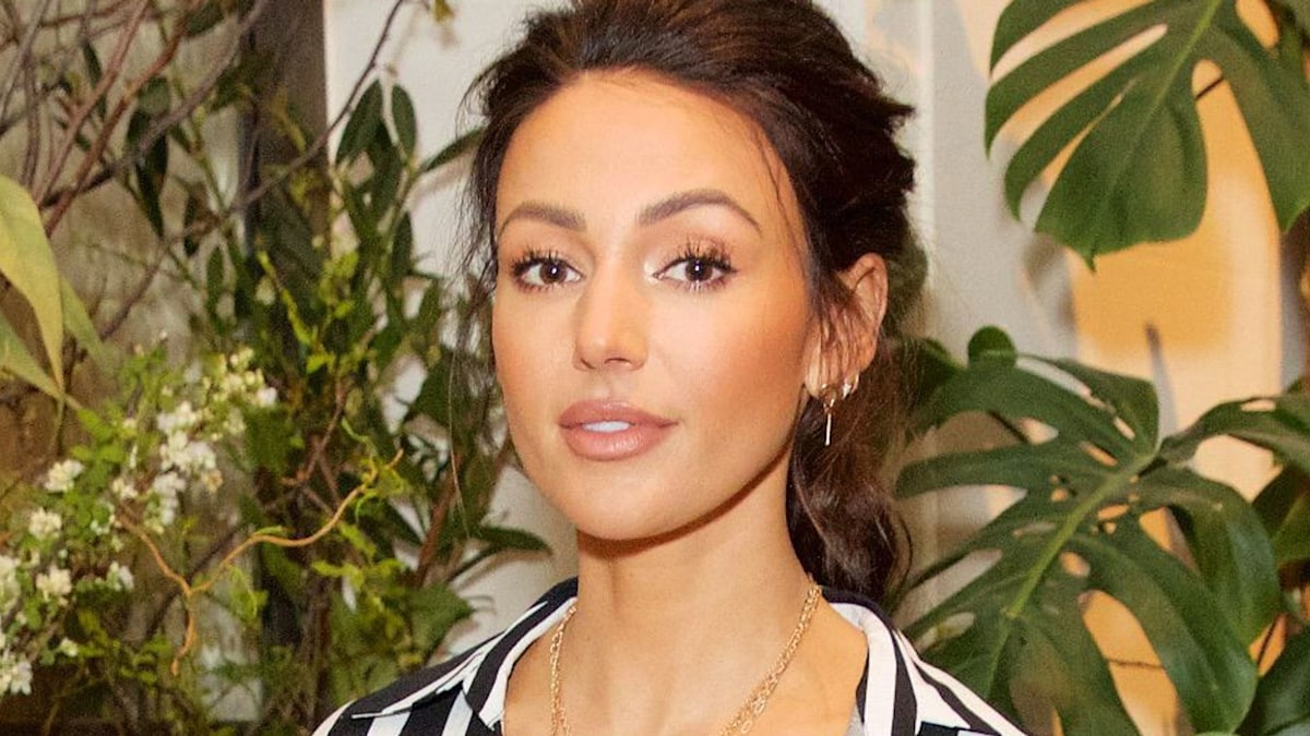 Michelle Keegan displays tanned and toned physique in shimmering mermaid bikini