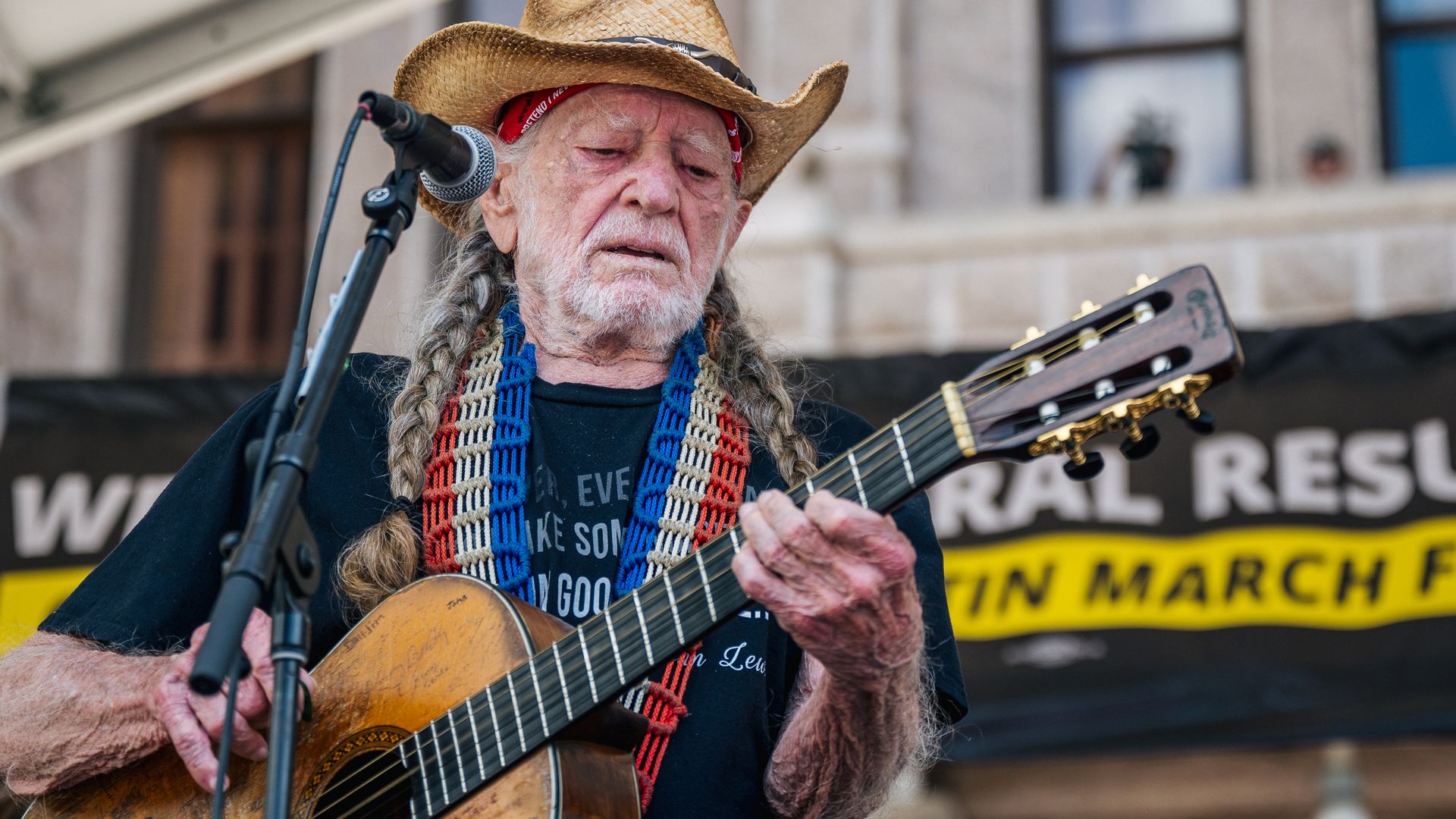 Willie Nelson performs during the Georgetown to Austin March for Democracy rally on July 31, 2021 in Austin, Texas