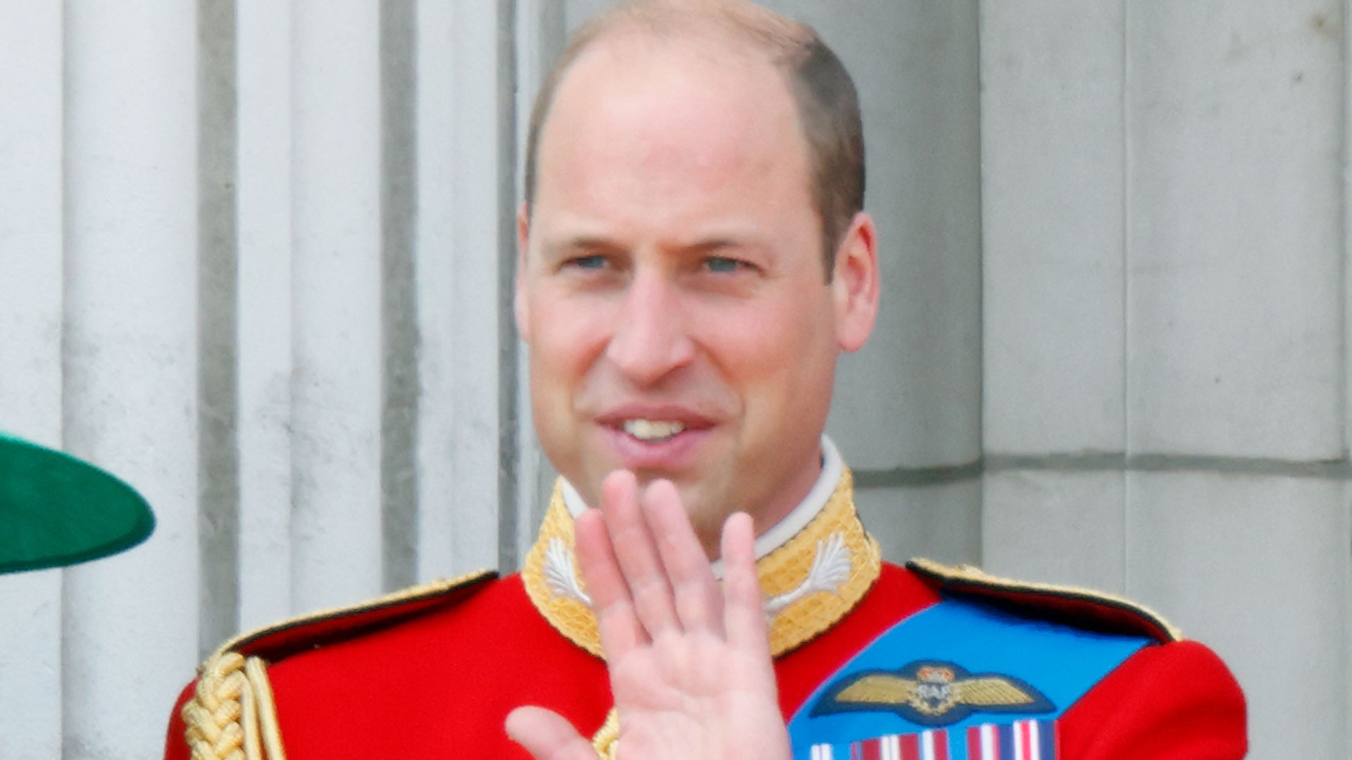 Prince William and Princess Charlotte waving
