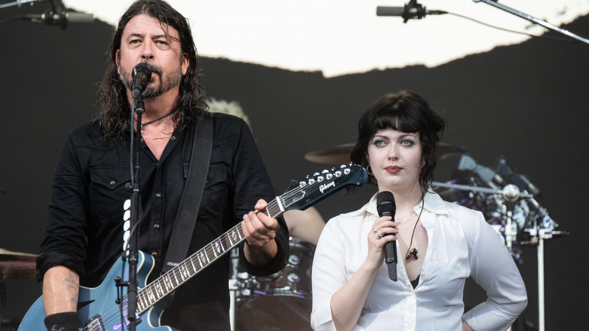 Dave Grohl from the Foo Fighters performs with his daughter Violet Grohl on The Pyramid Stage