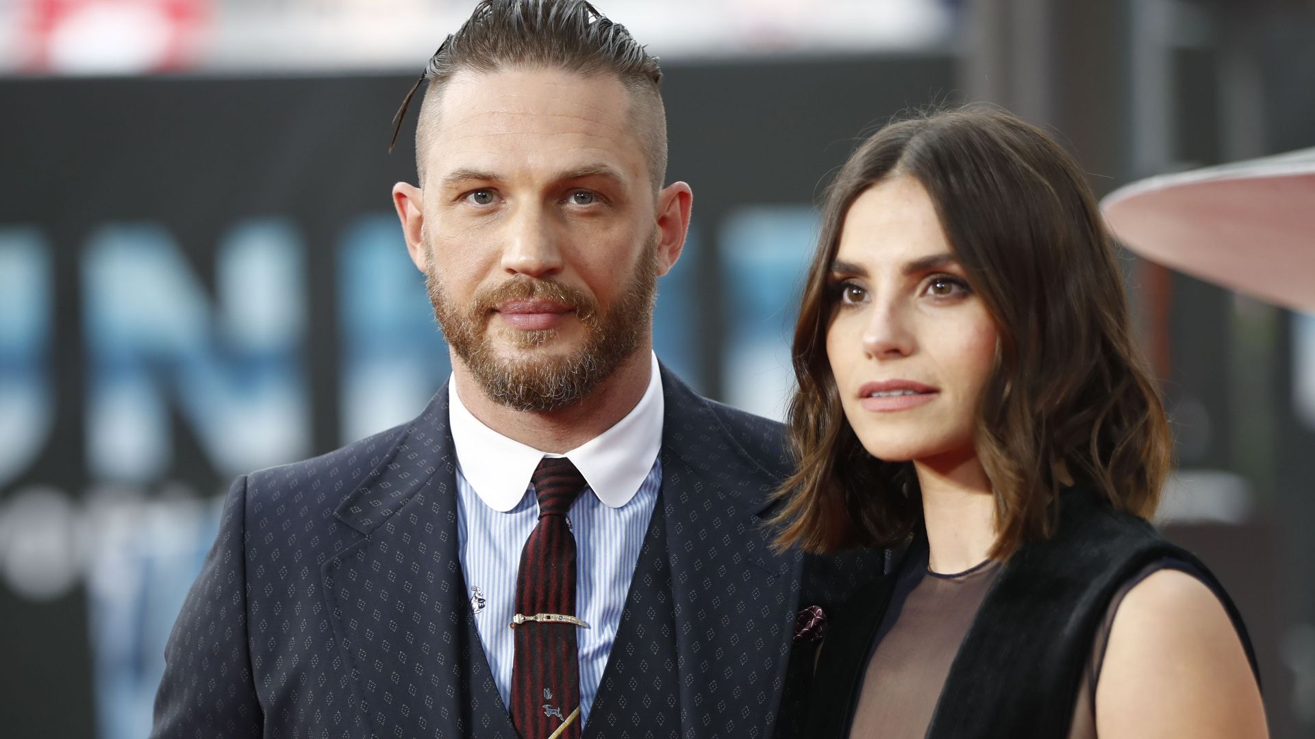 Tom Hardy was spotted being the perfect husband and father in Cannes