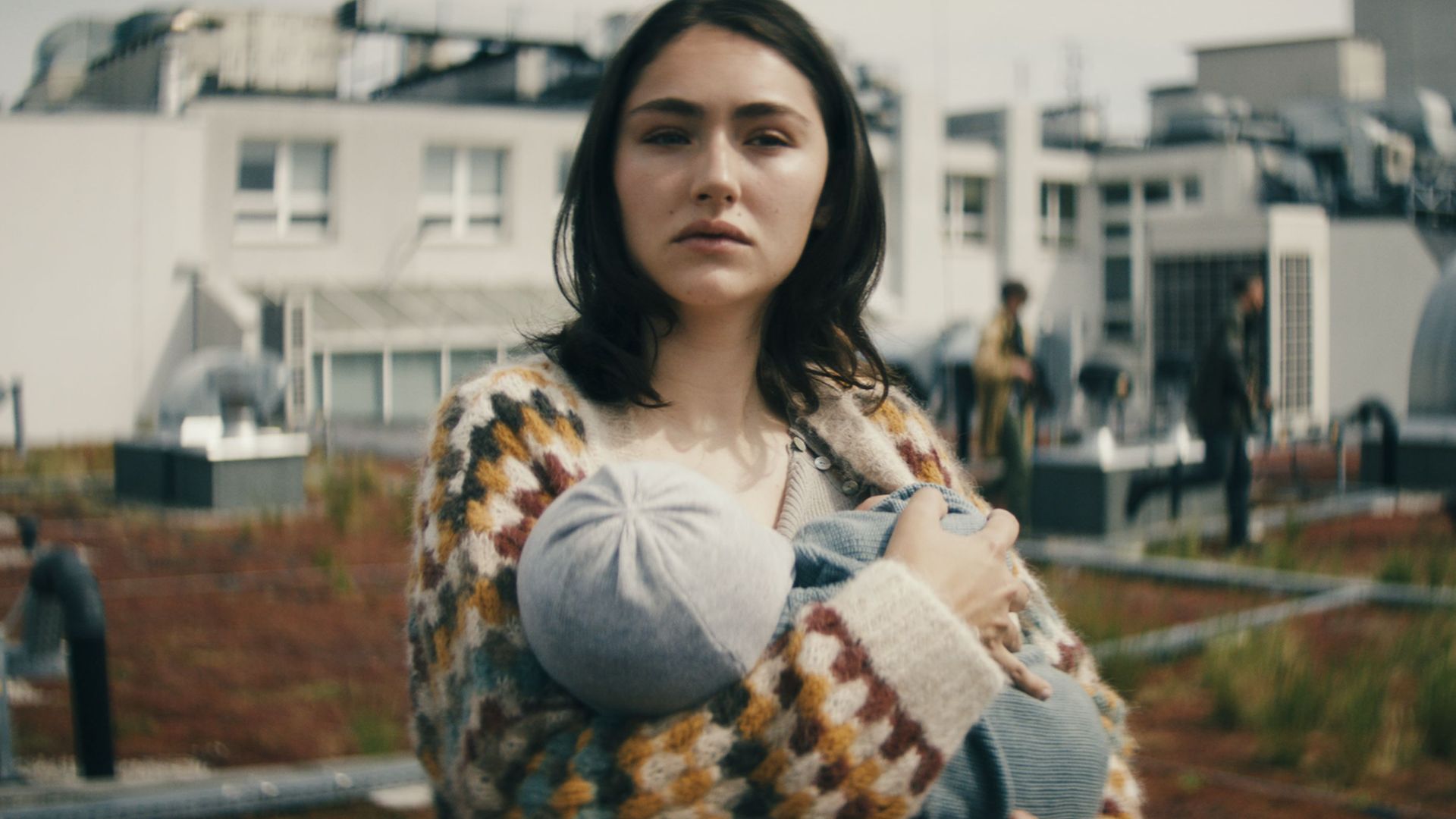 young woman holding baby