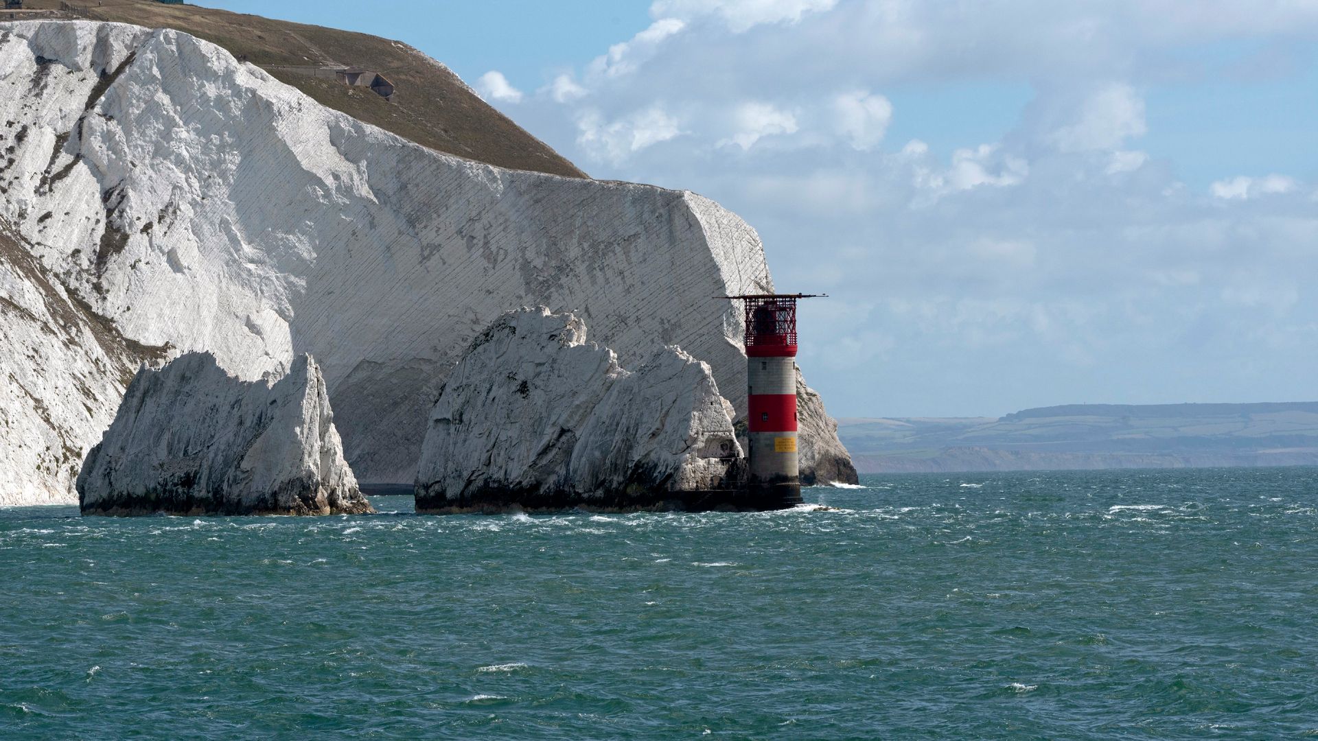 A view of The Needles rocks and a lighthouse