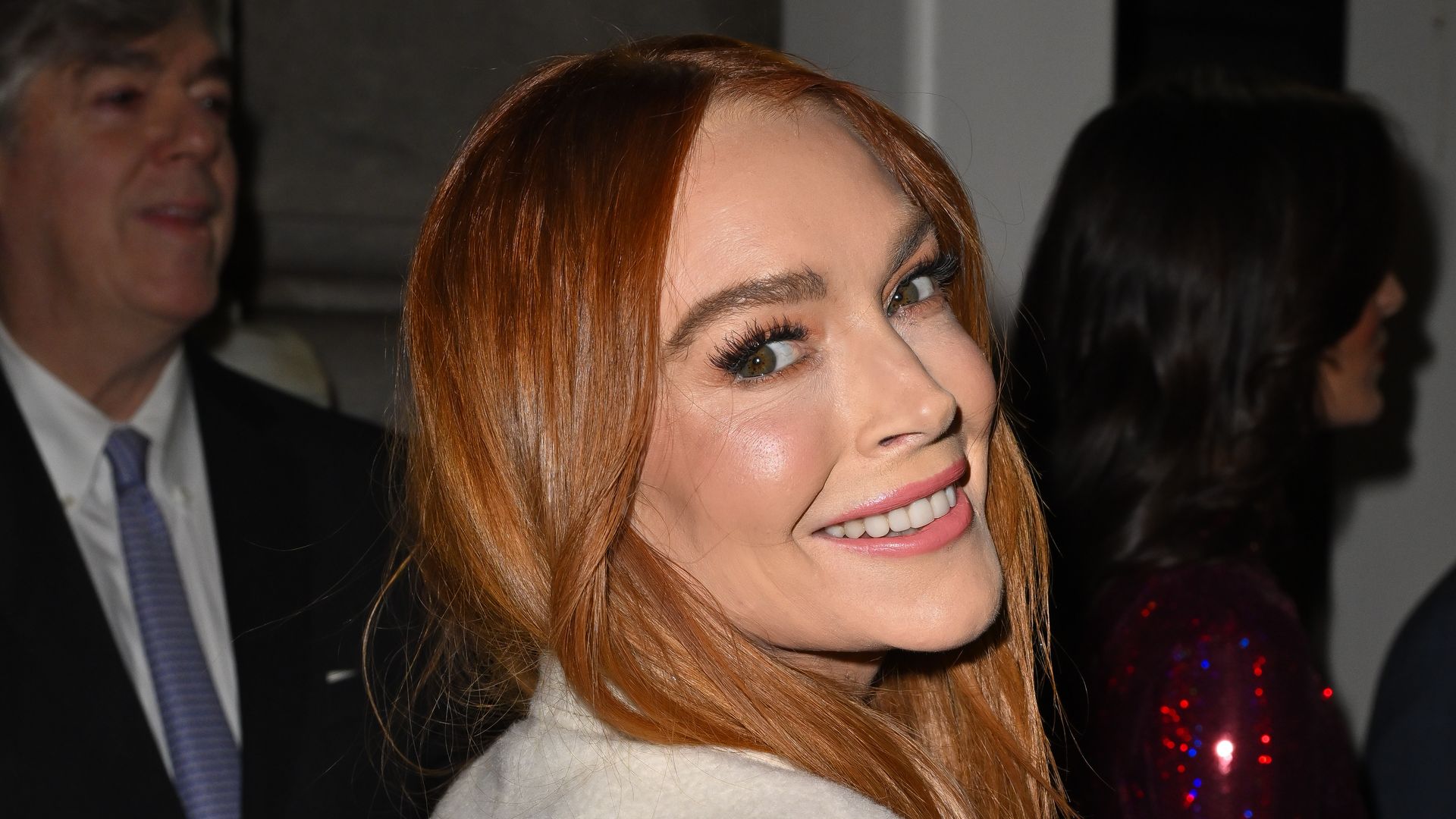 Lindsay Lohan departs The Plaza Hotel on her way to Netflix's "Irish Wish" screening at the Paris Theater on March 05, 2024 in New York City.