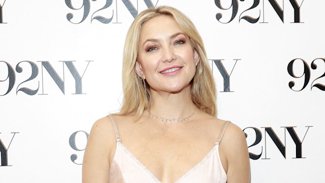 Kate Hudson wears a baby pink slip dress