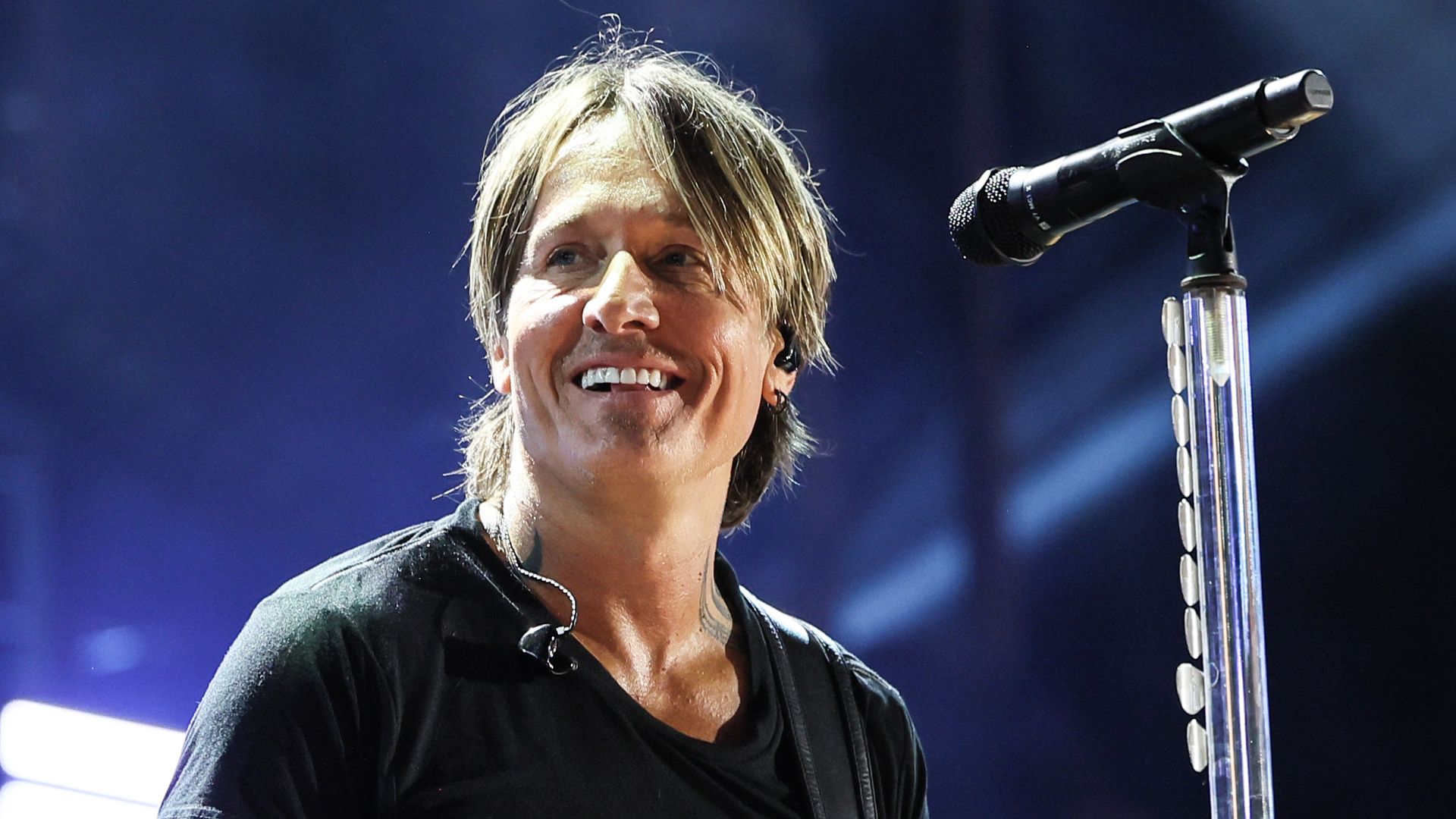 keith urban smiling onstage