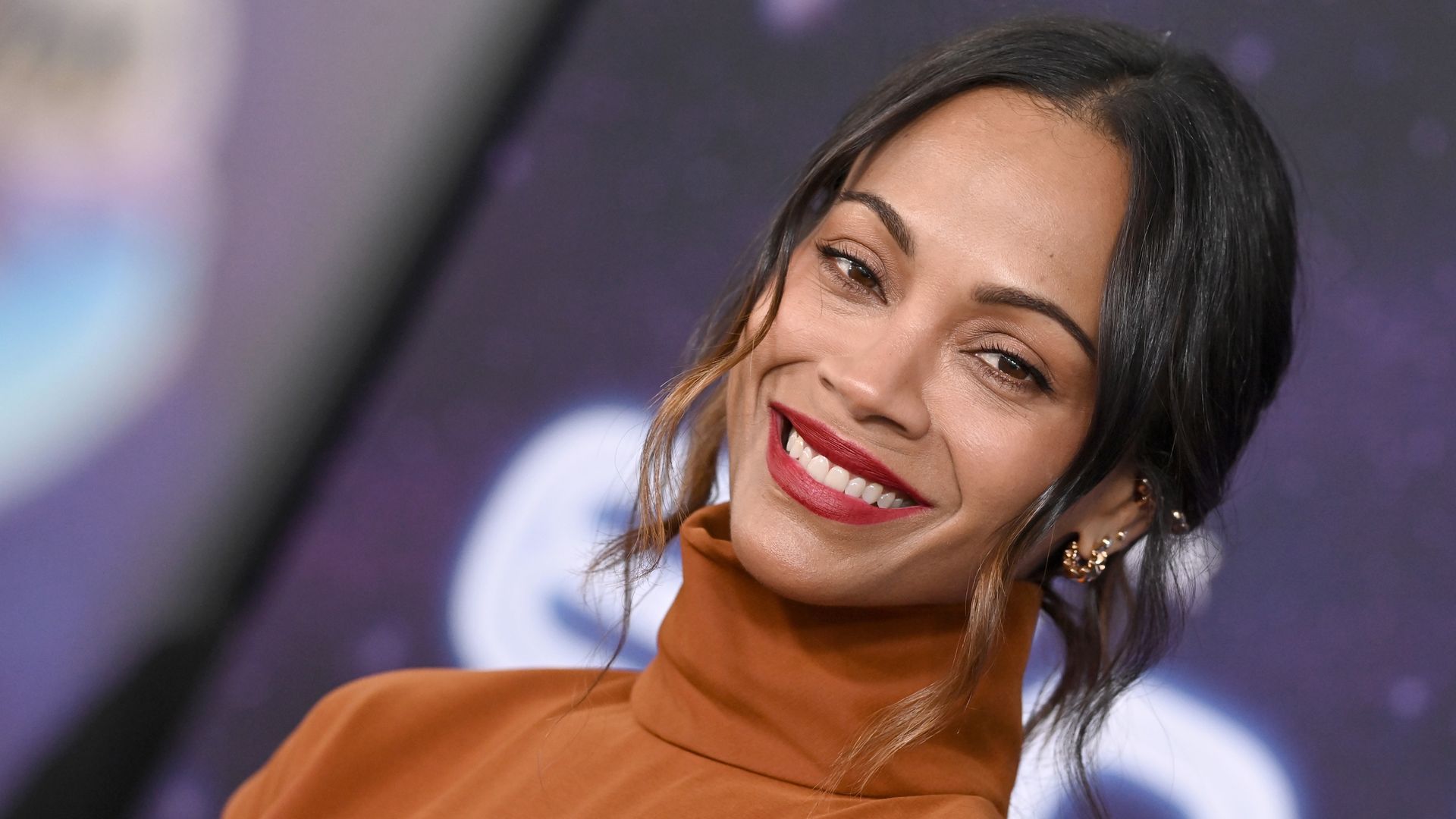 LOS ANGELES, CALIFORNIA - JUNE 10: Zoe SaldaÃ±a attends the Los Angeles Premiere of Disney Pixar's "Elio" at El Capitan Theatre on June 10, 2025 in Los Angeles, California. (Photo by Axelle/Bauer-Griffin/FilmMagic)