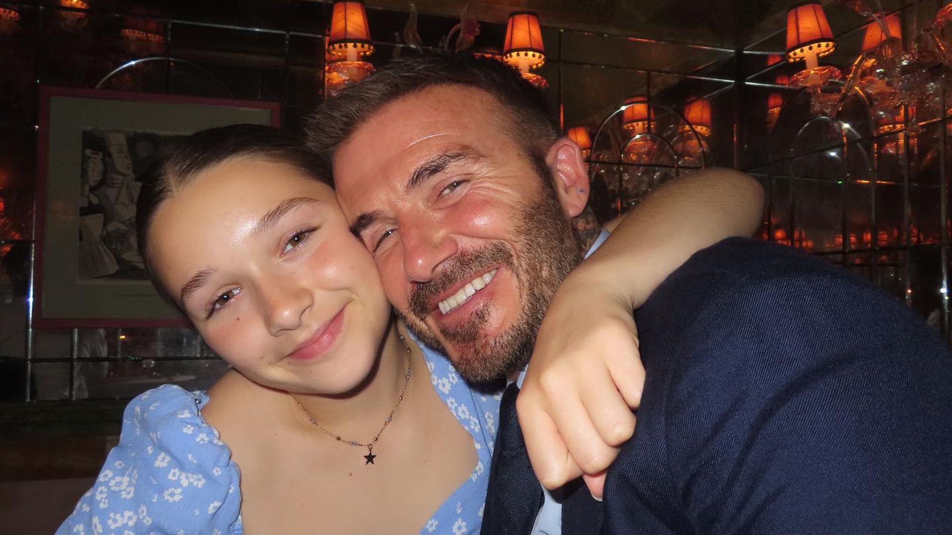 Harper Beckham hugging dad David Beckham during family outing