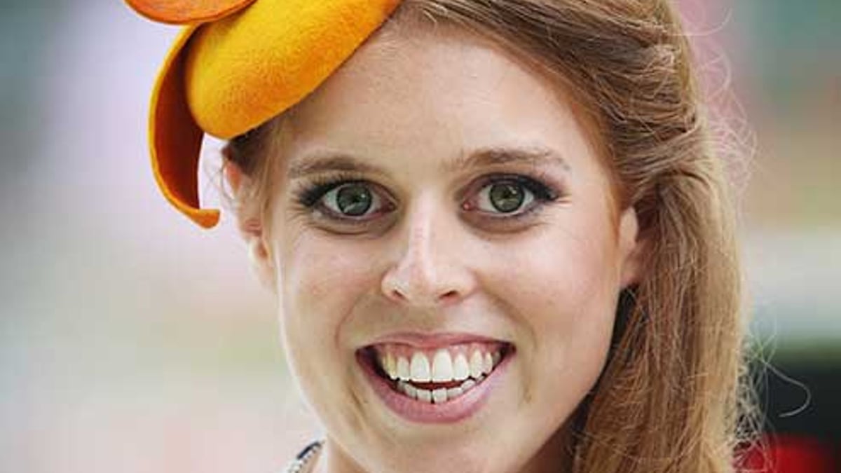 Princess Beatrice dresses to perfection in a sleek designer coat fit for a queen