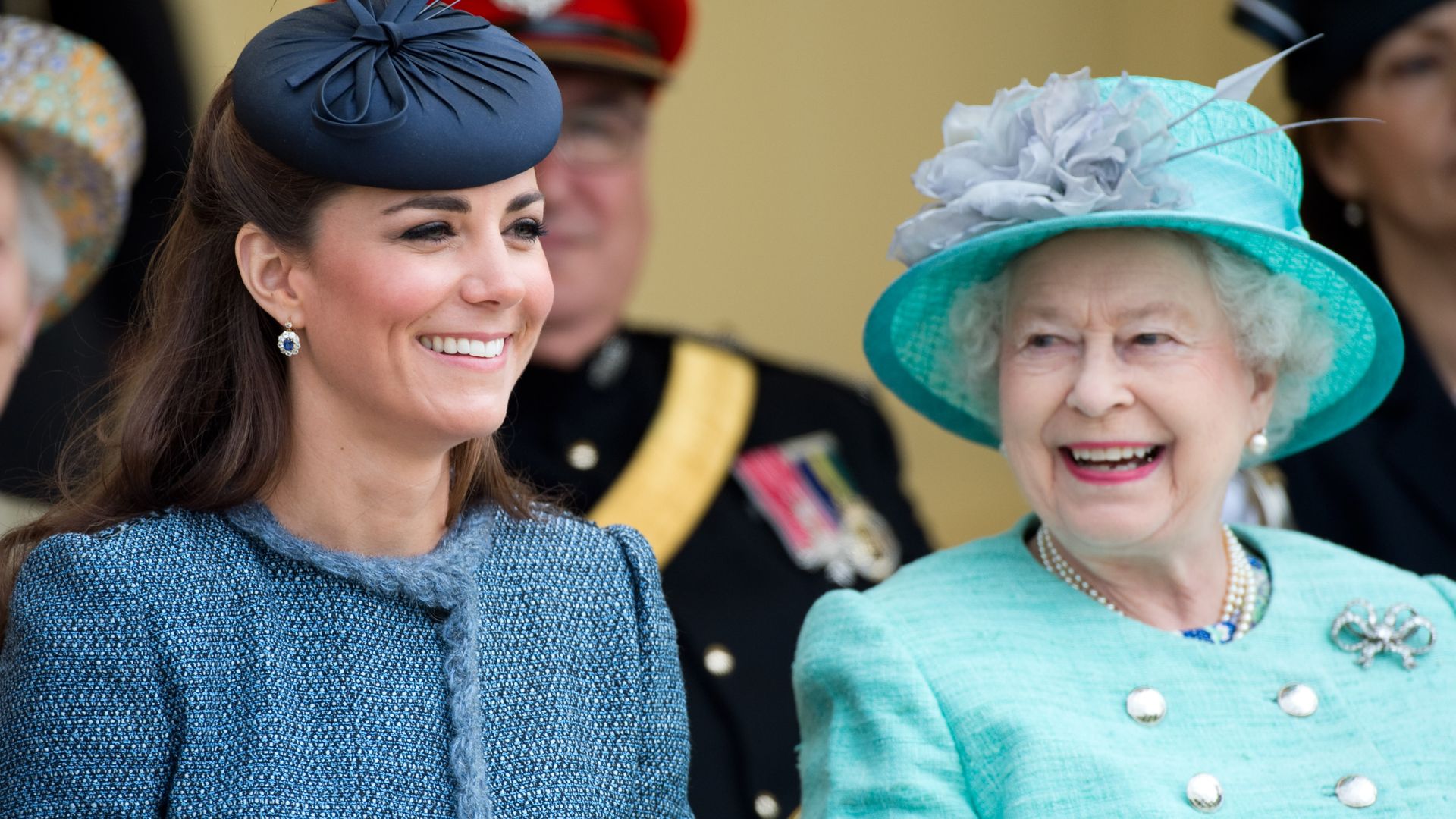 Queen Elizabeth II smiling at Princess Kate