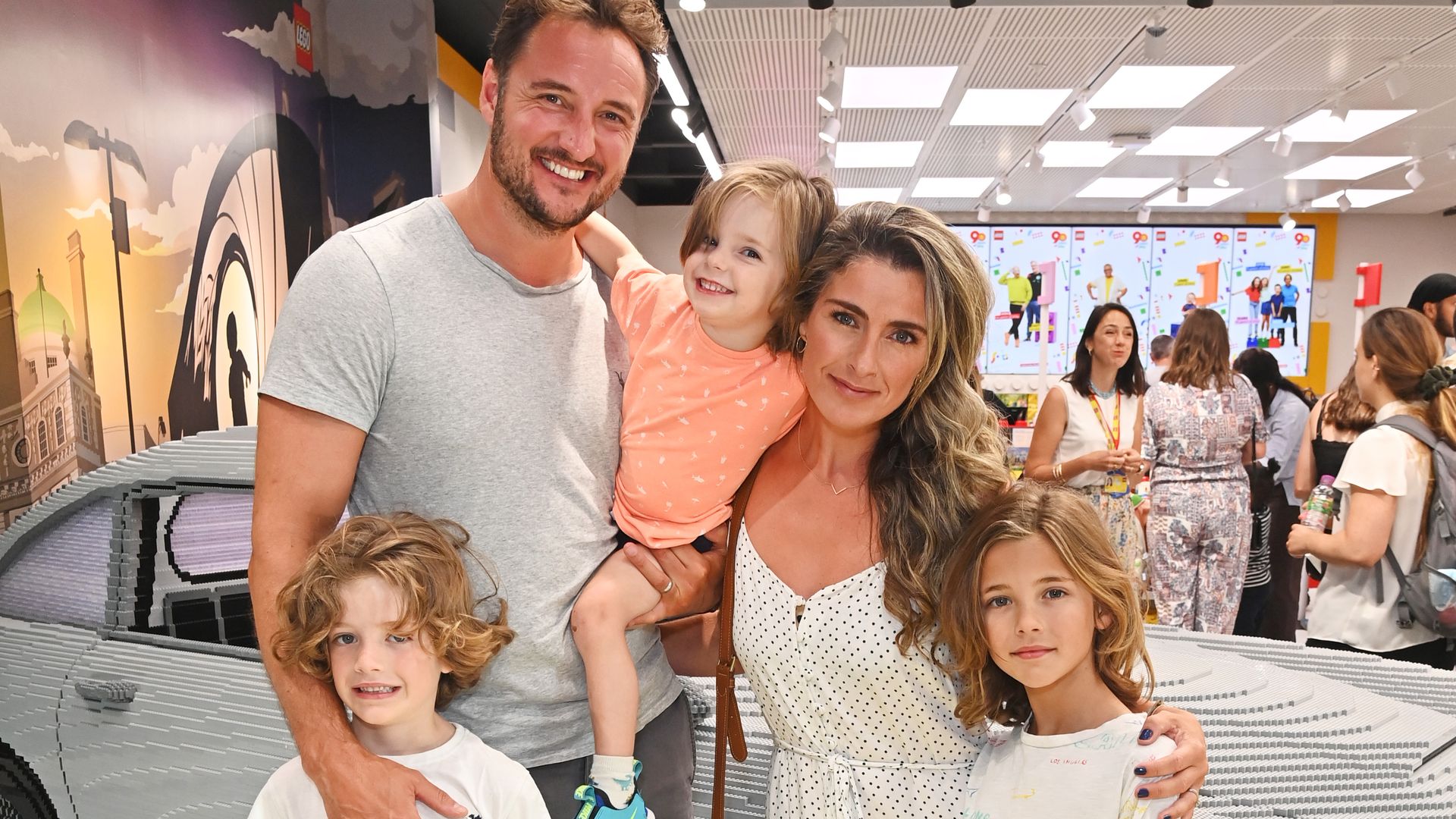 James Bye and Victoria Bye pose with children Edward, Louis and Hugo 