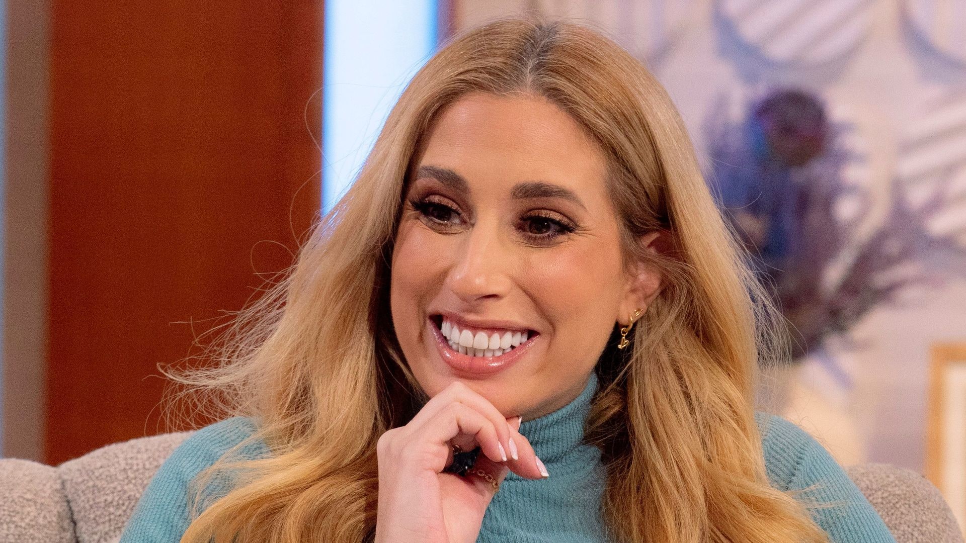 Stacey Solomon wears a turquoise dress on the Lorraine show