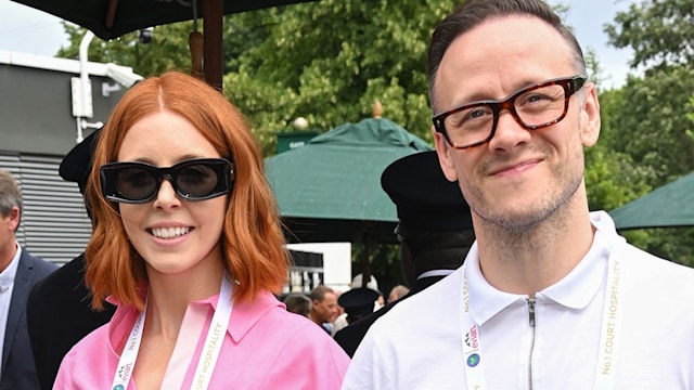 stacey dooley and kevin clifton hold hands