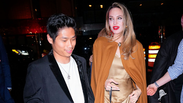 Angelina Jolie and Pax Jolie-Pitt arrive at the afterparty of "The Outsiders" 