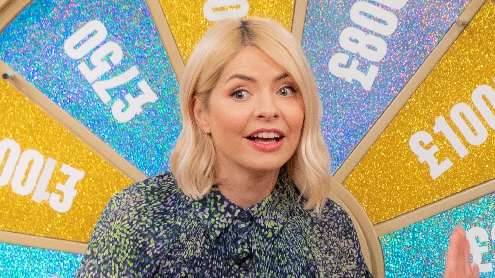 Holly Willoughby in a floral dress on This Morning