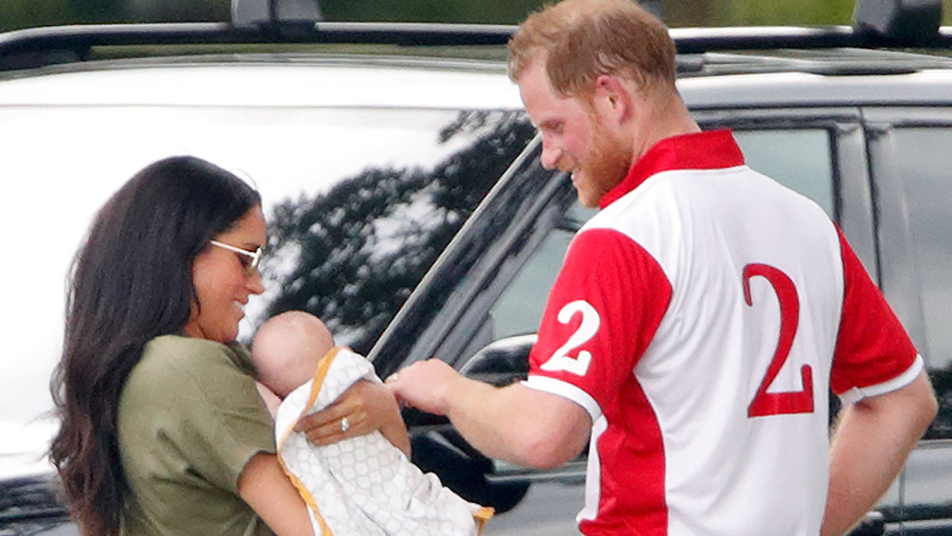 prince harry and meghan dote on archie