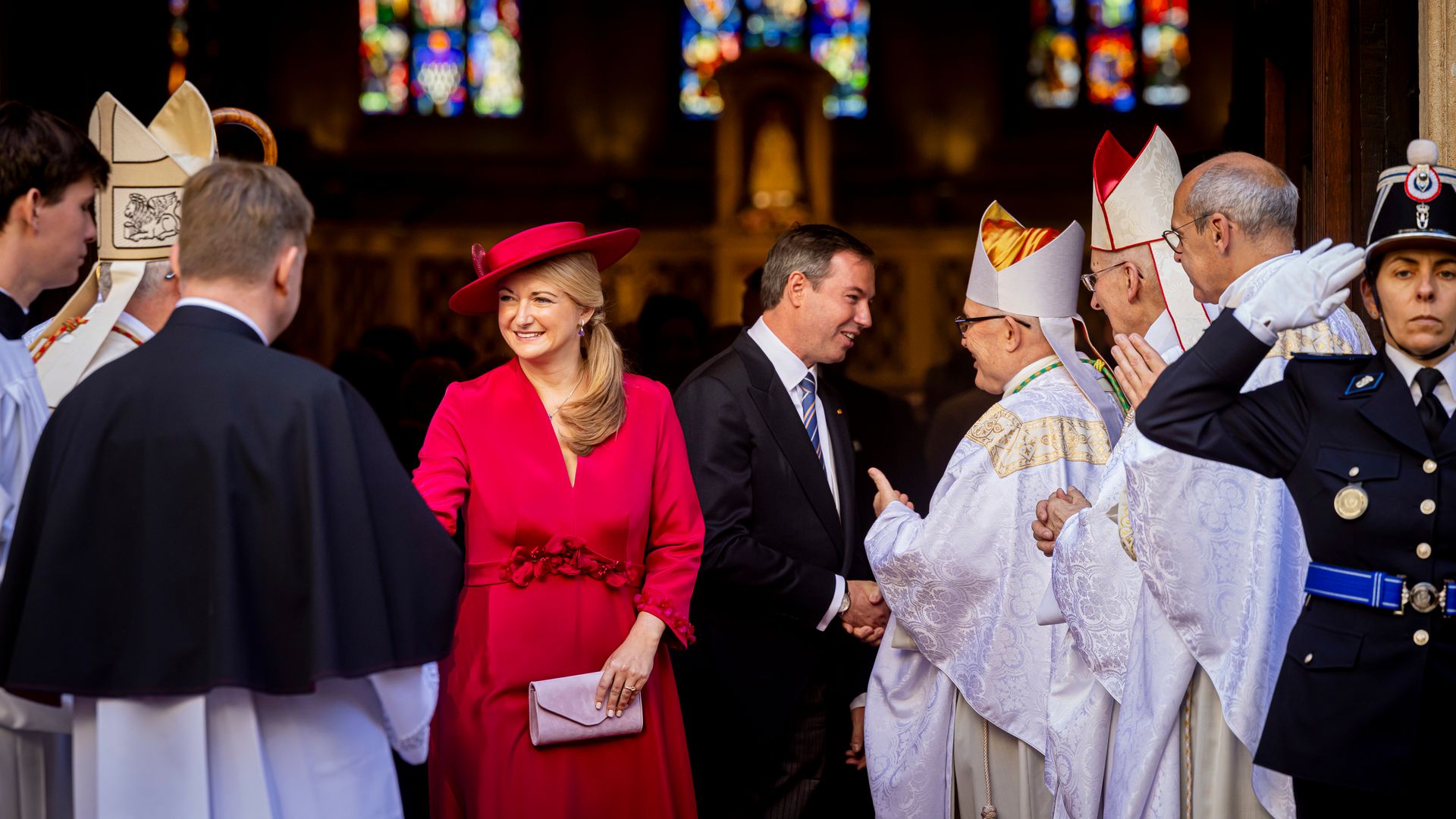 Grand Duchess Stephanie of Luxembourg and Grand Duke Guillaume of Luxembourg depart from the cathedral meeting ministers