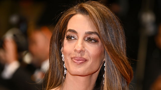 photo of amal clooney in black dress at cannes film festival