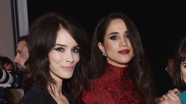 Actors Abigail Spencer, Meghan Markle, pose together at a dinner