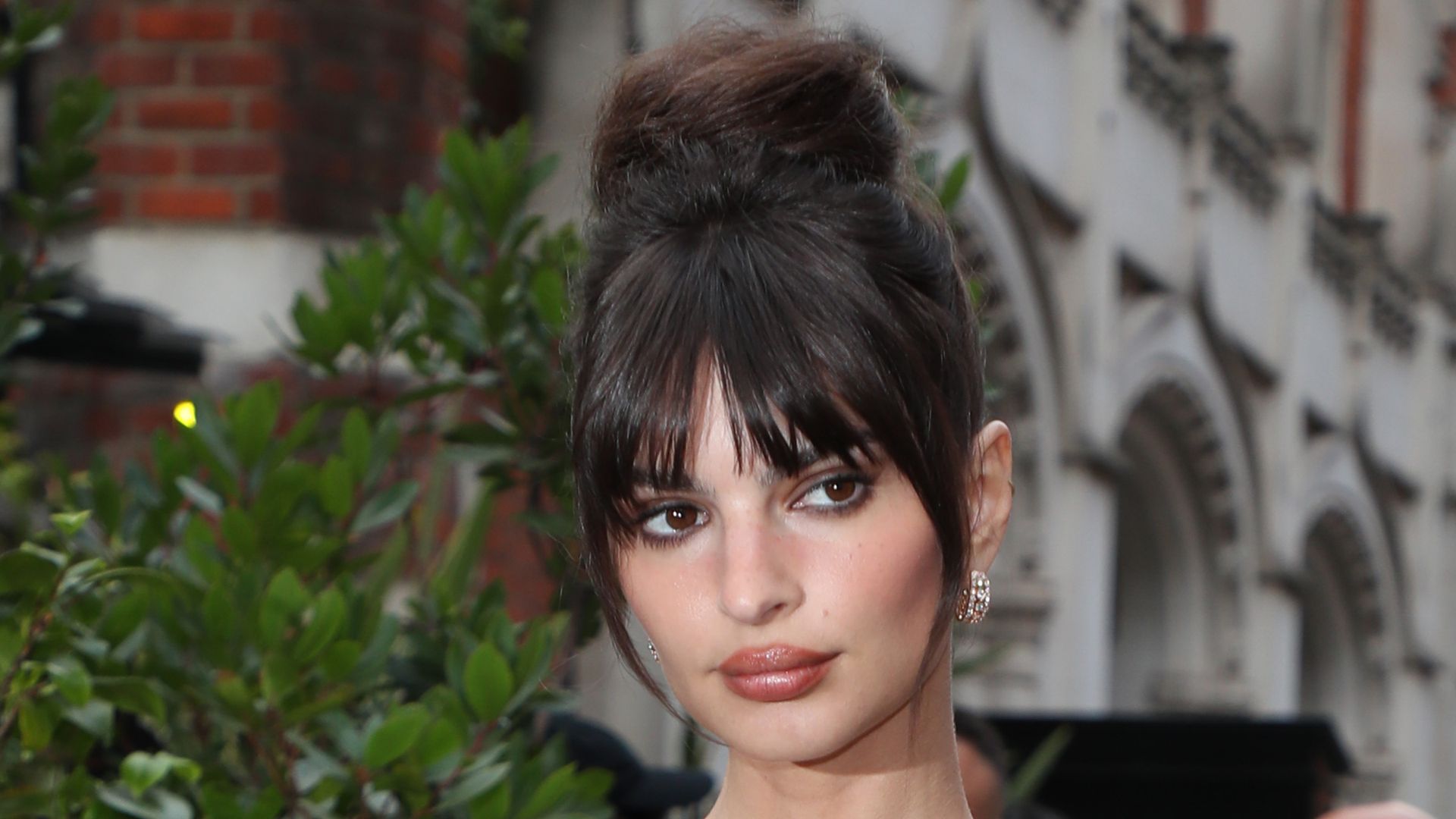 LONDON, ENGLAND - JULY 13: Emily Ratajkowski arrives at the British Vogue x Self Portrait Summer Party at The Chiltern Firehouse on July 13, 2023 in London, England. (Photo by Neil Mockford/GC Images)