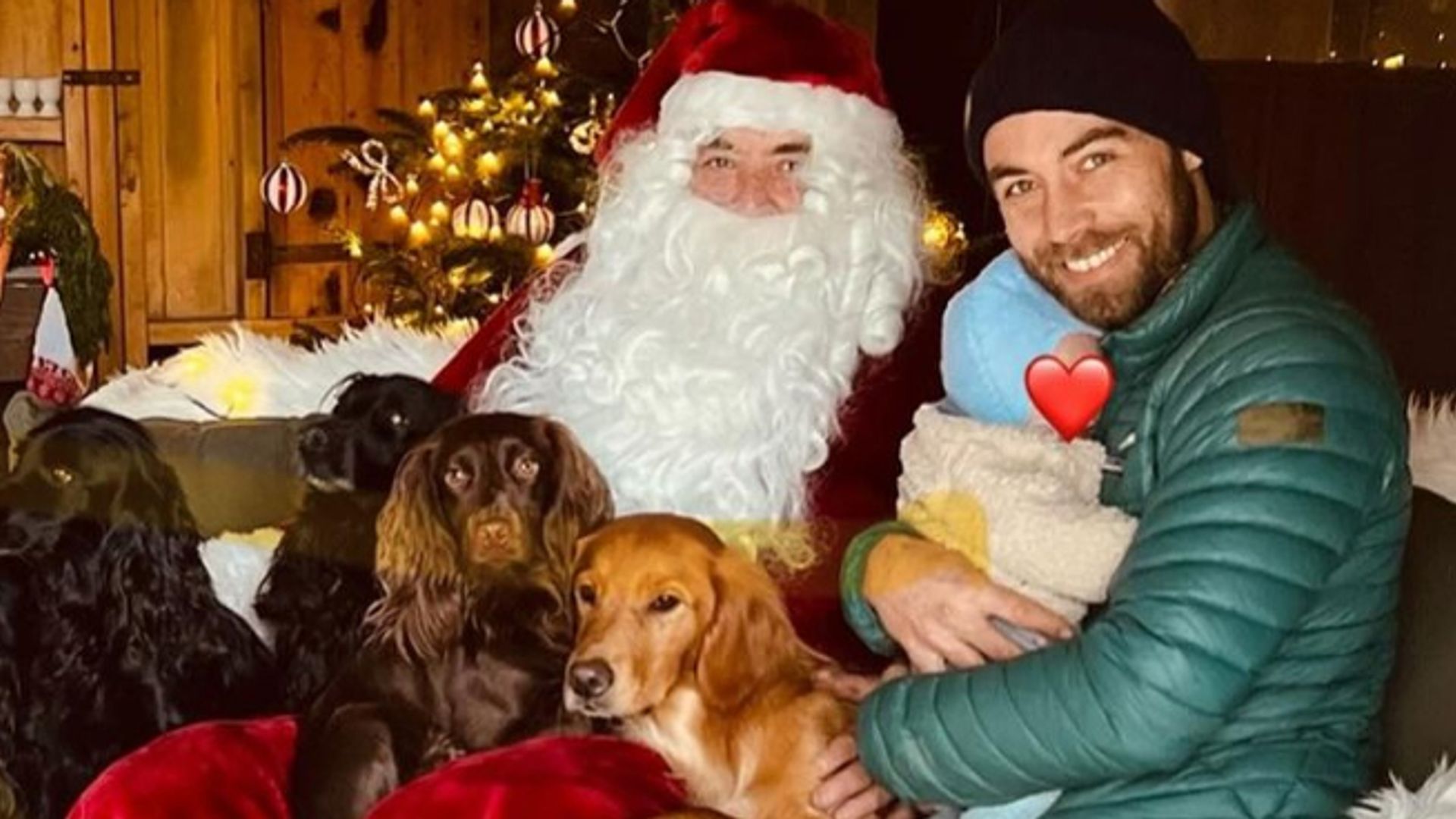 James Middleton and his son Inigo and the family dogs with Santa Claus