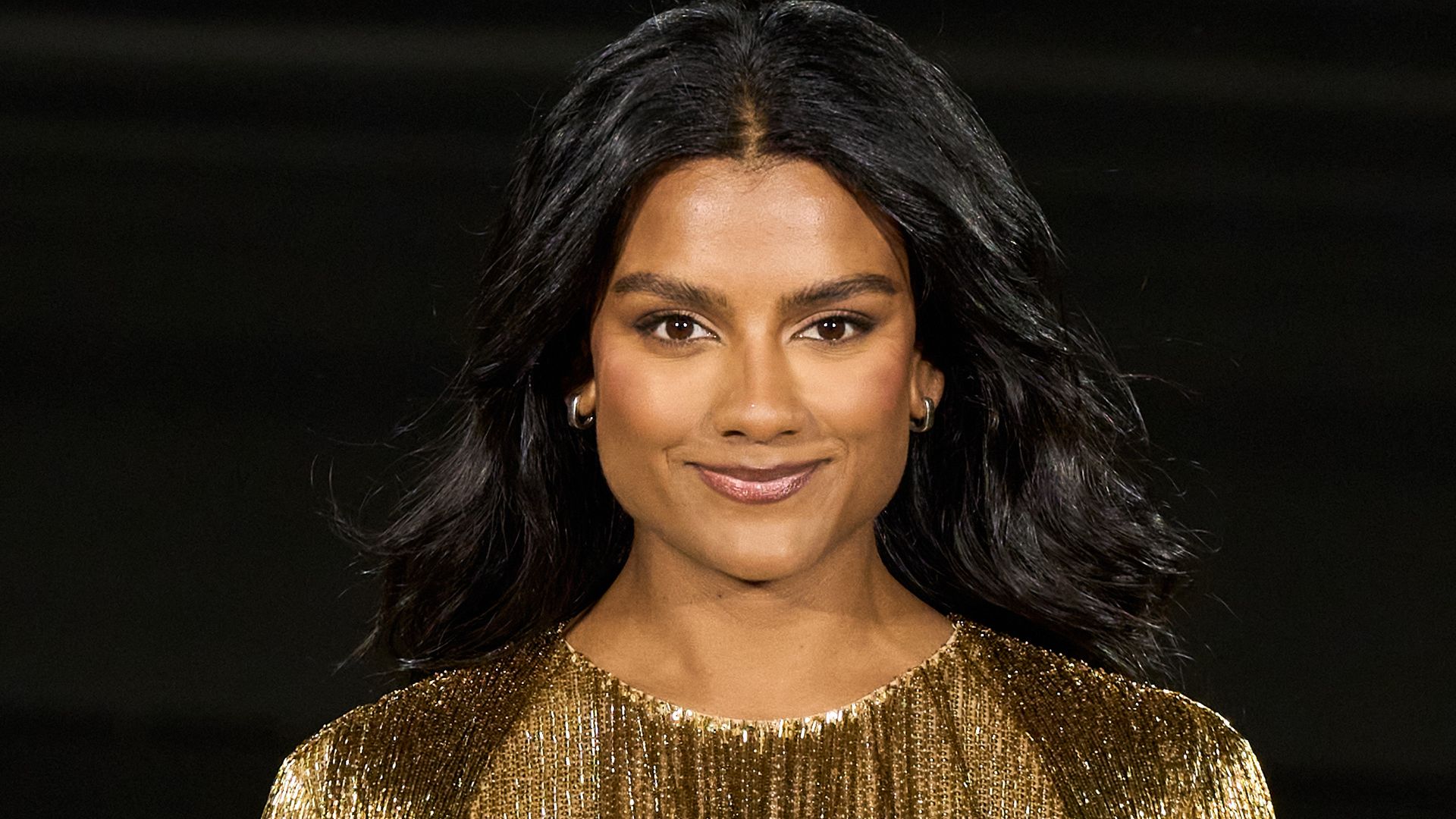 Simone Ashley walks the runway during the L'Oreal runway in Paris