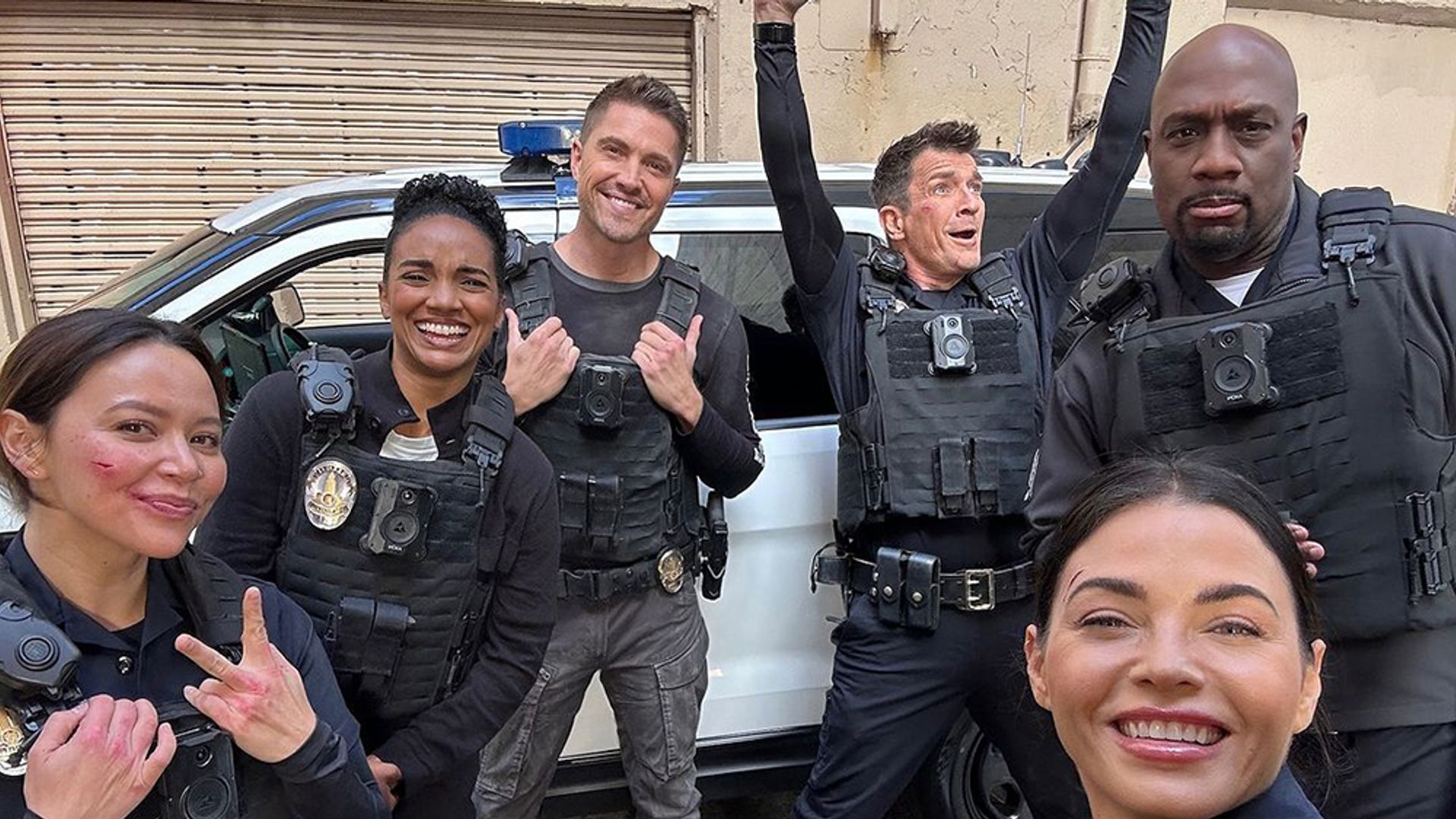 Jenna Dewan takes a selfie with the cast of The Rookie on set 
