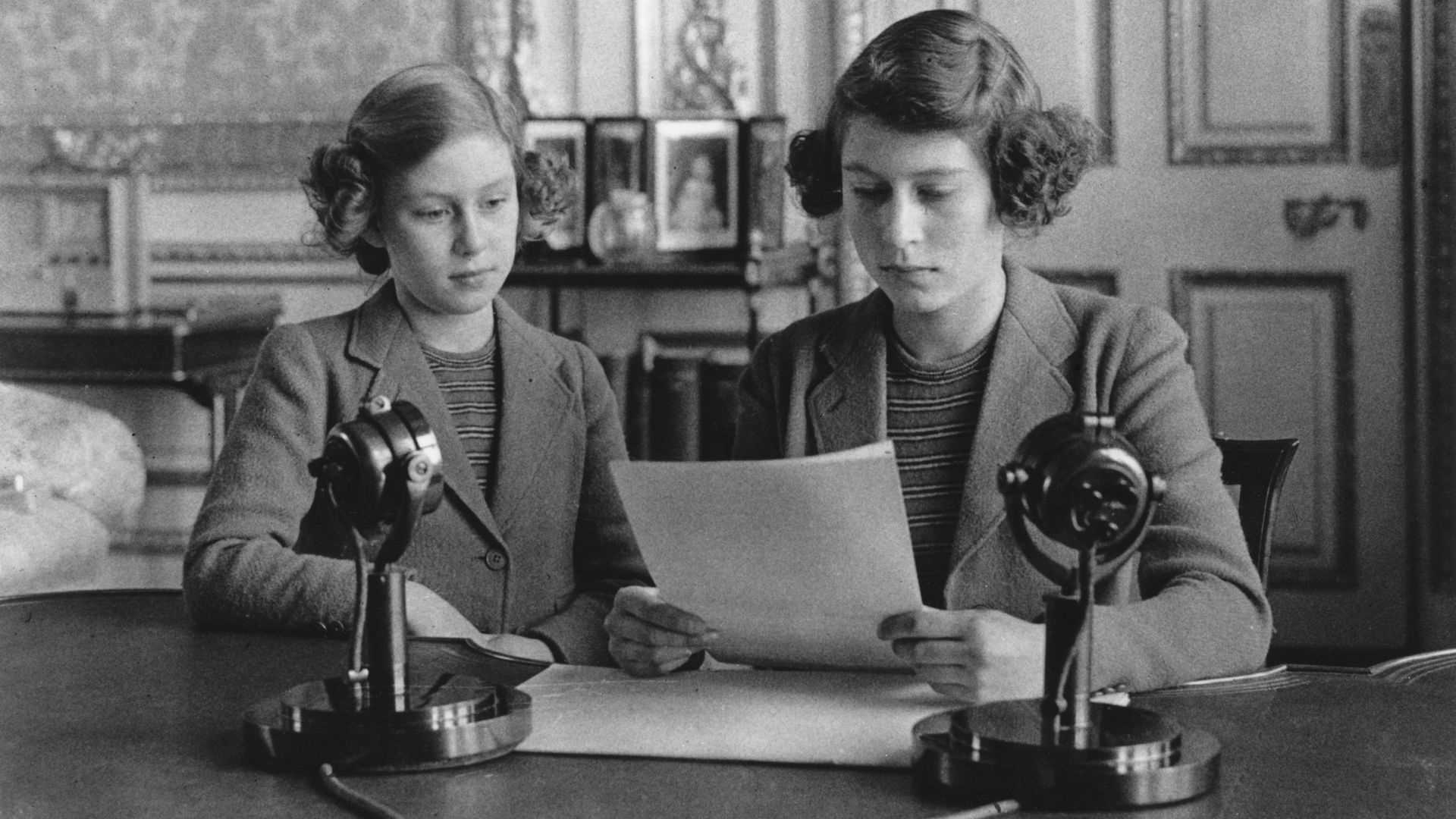 A young Princess Margaret and Queen with a script in front of them