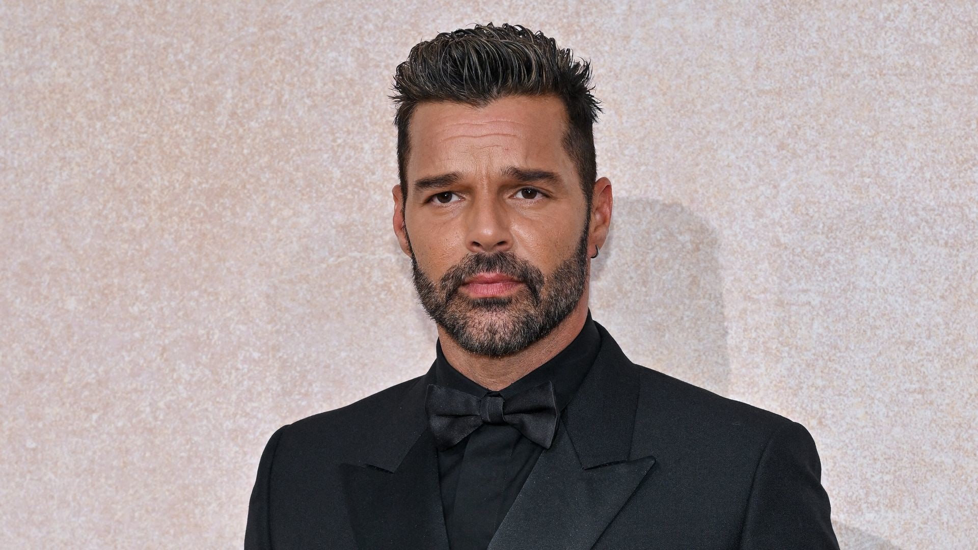 Ricky Martin in black suit