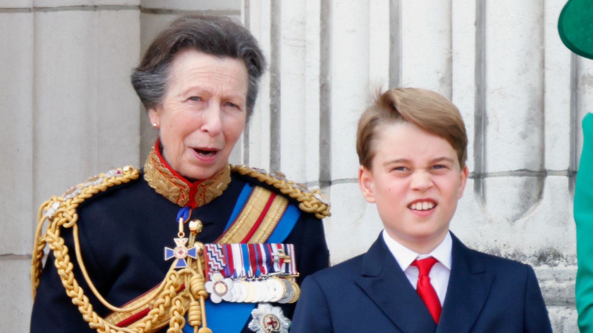 Princess Anne watches the military flypast with Prince George