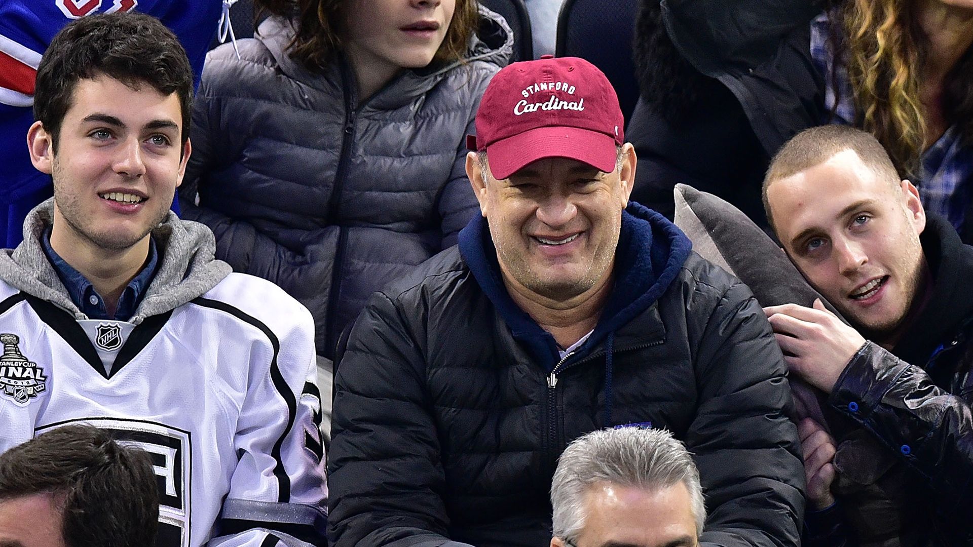 Tom Hanks with sons Chet and Truman at a New York Rangers game