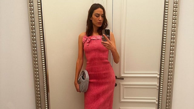 Alexa Chung wears a pink ruffed dress from super Yaya