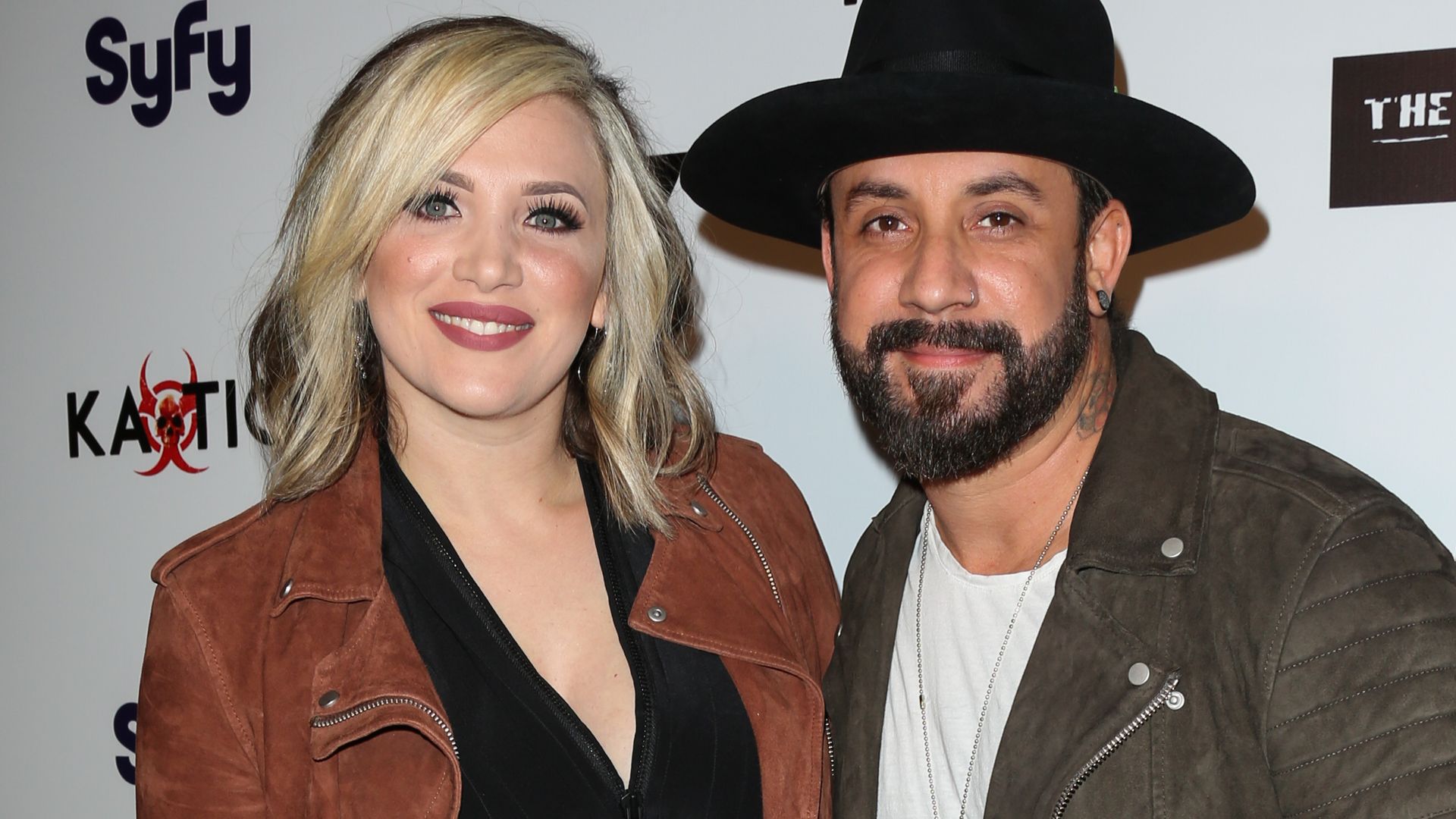 Singer AJ McLean (R) and his Wife Rochelle Deanna Karidis (L) attend the premiere of Syfy's "Dead 7" at Harmony Gold on April 1, 2016 in Los Angeles, California.